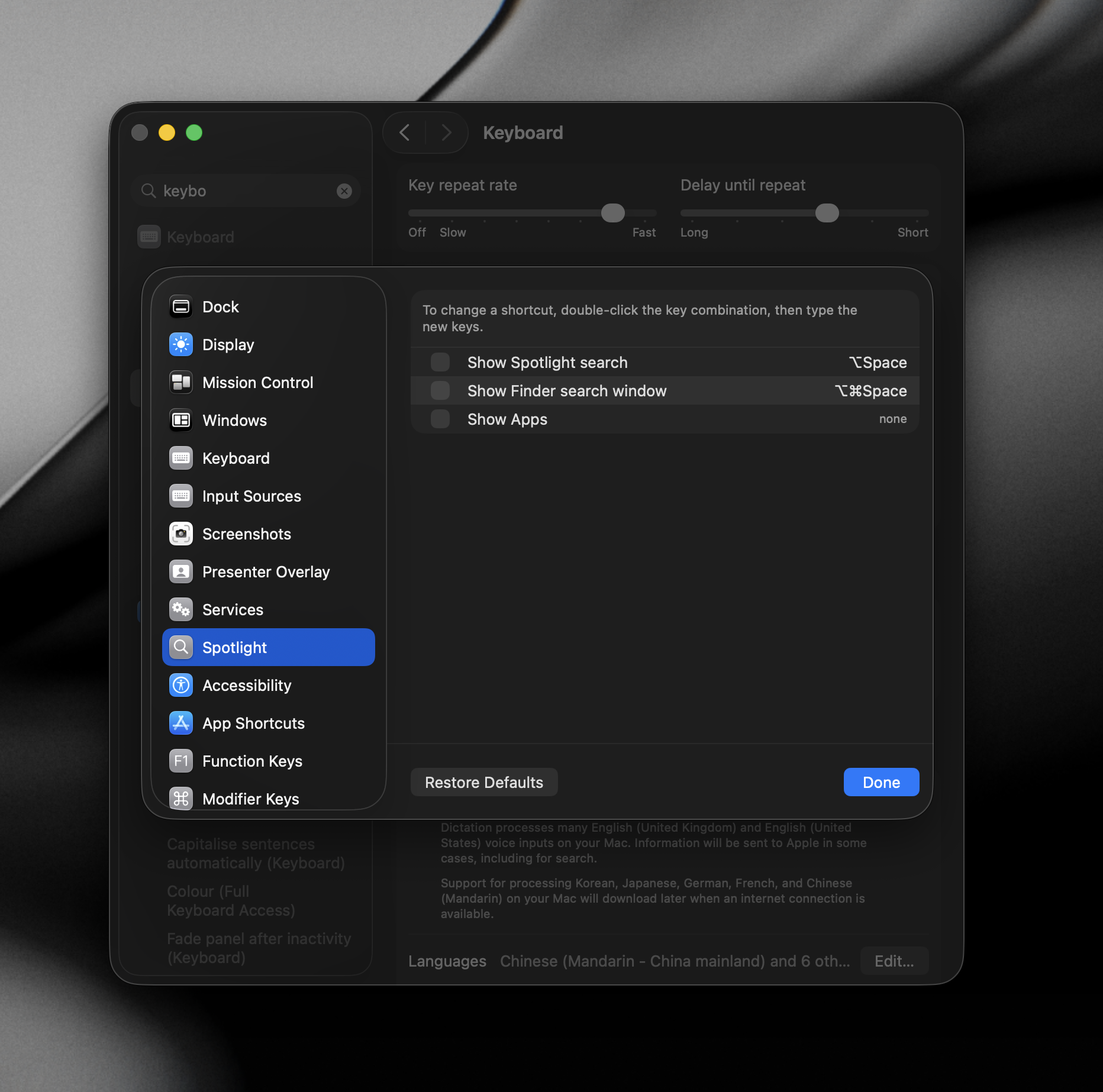 Screenshot of System Settings showing the Spotlight keyboard shortcut being turned off